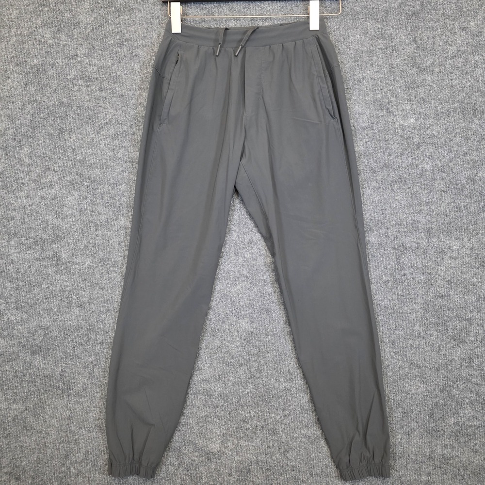 Lululemon Surge Jogger Mens S Gray Swift Fabric Tapered Running Pants Reflective
